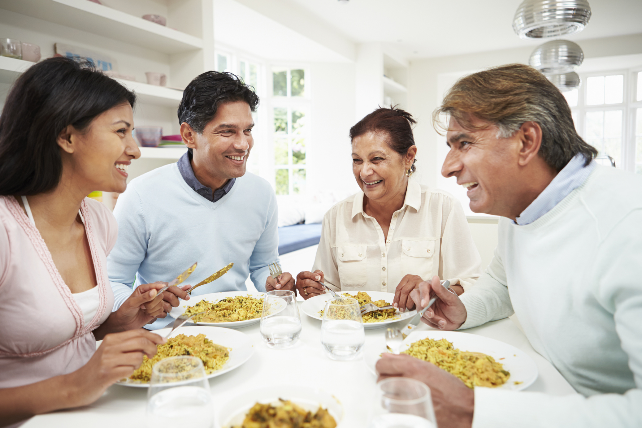 Indian Family Eating Meal at Home